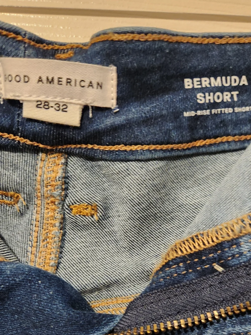 Women's Dark Blue Distressed Denim Bermuda Shorts. Size 28 - 32
